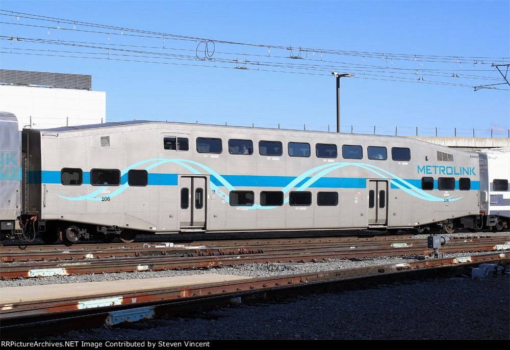 Metrolink coach SCAX #106 rehabbed by Talgo and painted to match the Rotem fleet.